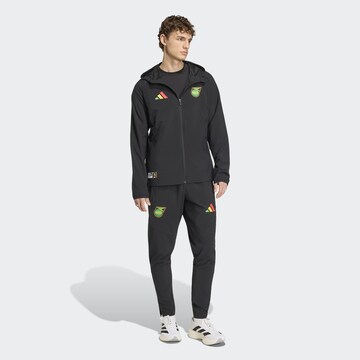Slimfit Pantaloni sportivi 'Jamaika x Bob Marley Tiro Travel' di ADIDAS PERFORMANCE in nero