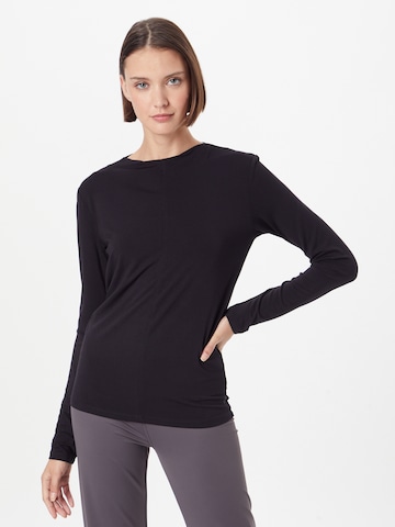 CURARE Yogawear - Camiseta funcional 'Flow' en negro: frente