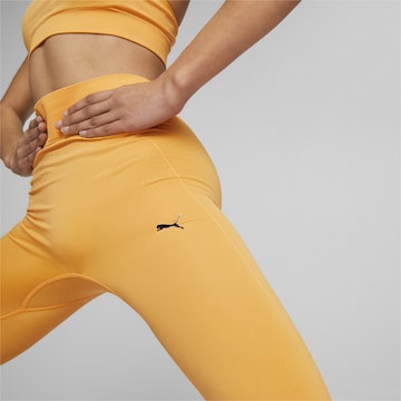 PUMA Skinny Sportovní kalhoty 'STUDIO FOUNDATIONS' – oranžová