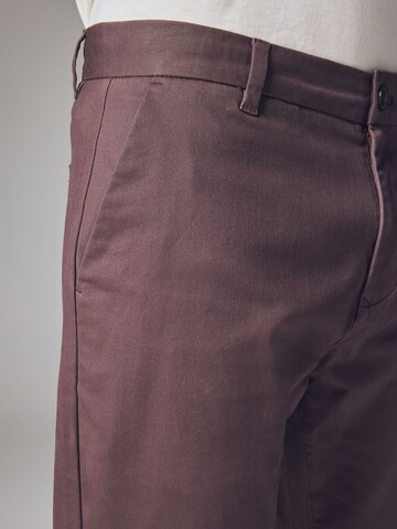 Next Slimfit Chinohousut värissä lila