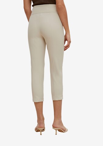 COMMA Skinny Spodnie w kolorze beżowy: tył