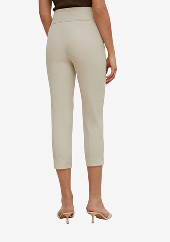 Skinny Pantalon COMMA en beige : derrière