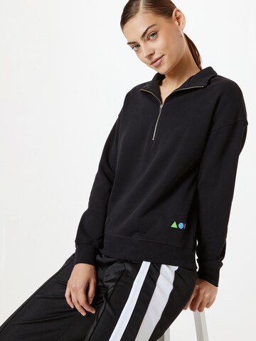 Sweat-shirt NU-IN en noir : devant