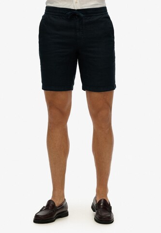 Slimfit Pantaloni chino di Superdry in blu: frontale