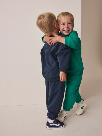 Set Next en bleu