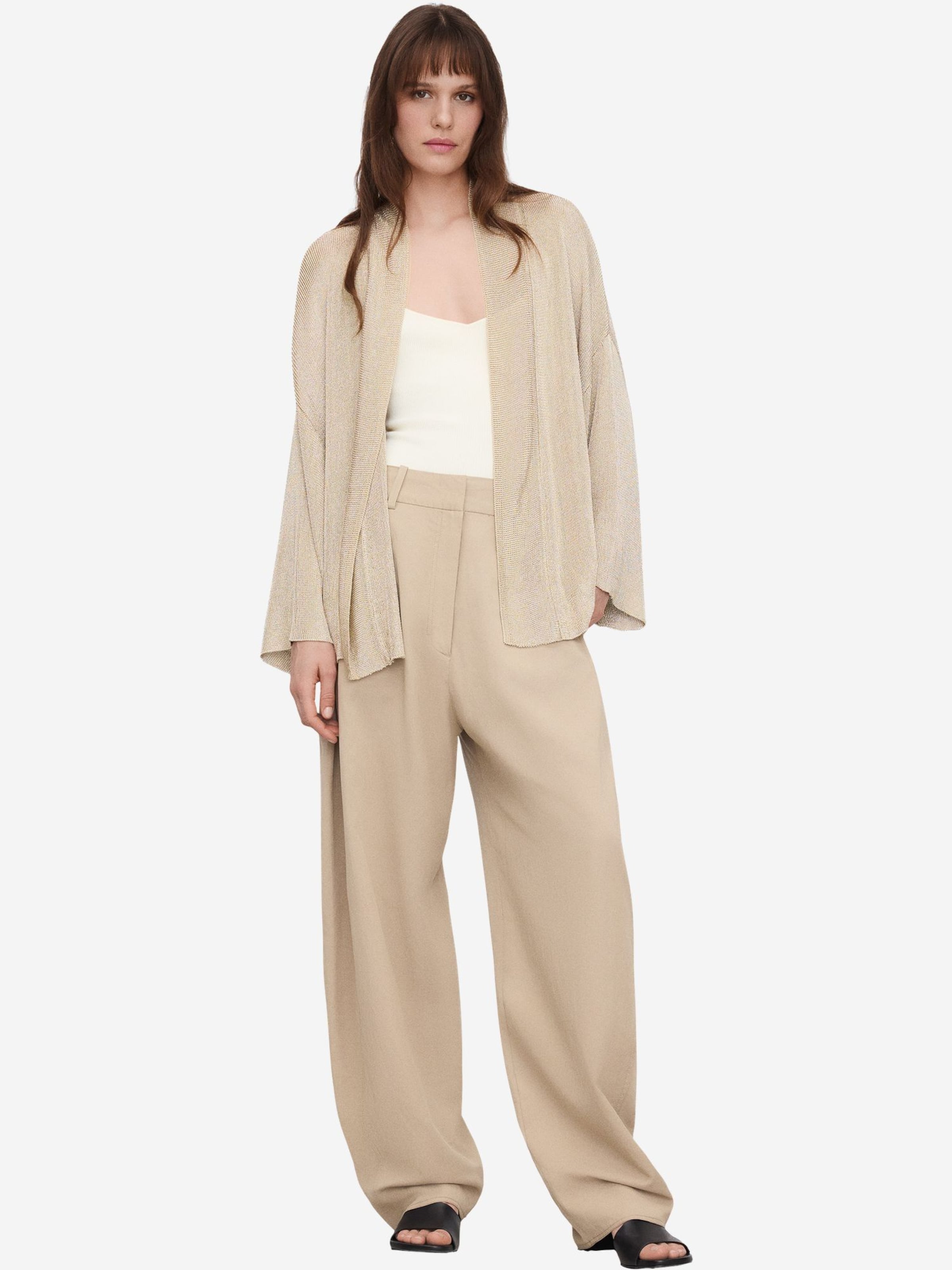 Adolfo Dominguez Kofta i guld