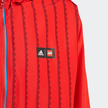 Veste outdoor ADIDAS SPORTSWEAR en rouge