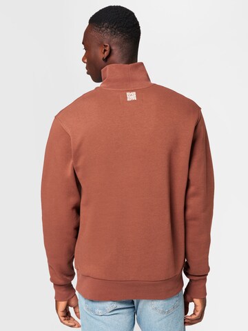 Champion Authentic Athletic Apparel Sweatshirt in Brown