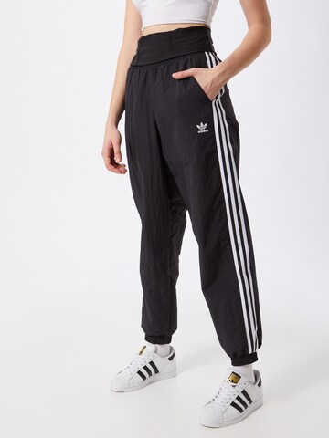 ADIDAS ORIGINALS Tapered Trousers in Black: front