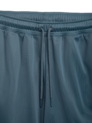 Loosefit Pantaloni sportivi 'Athletic DMWU' di Unfair Athletics in blu