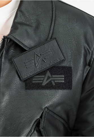 ALPHA INDUSTRIES Tussenjas 'Cwu Fl Mod' in Zwart