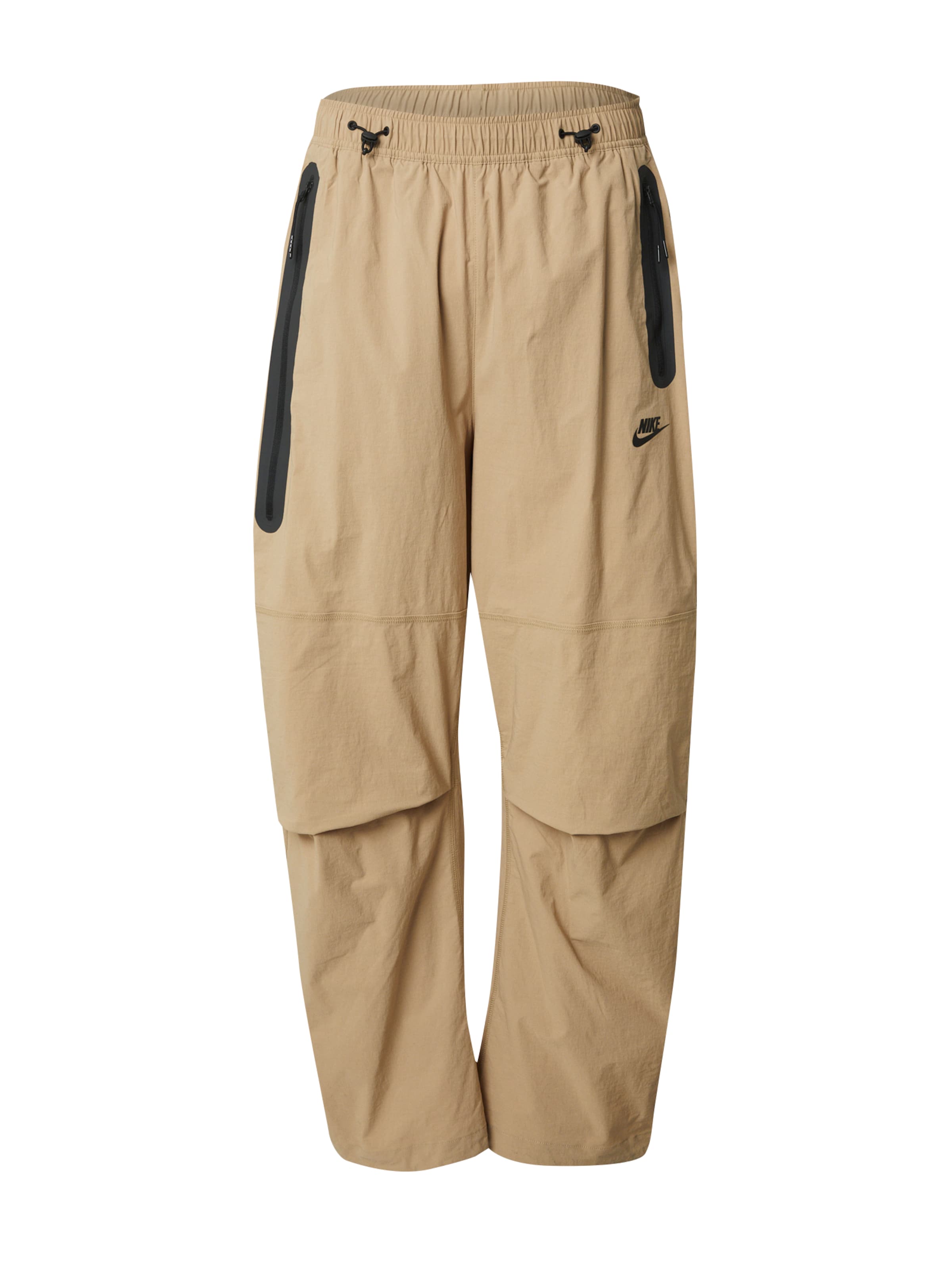 Nike Sportswear Luźne Spodnie 'Tech' w kolorze beżowy: przód