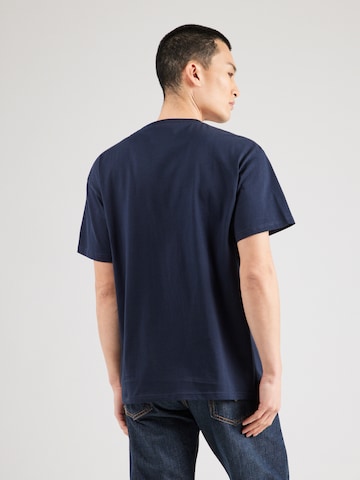 Tricou 'Chase' de la Carhartt WIP pe albastru