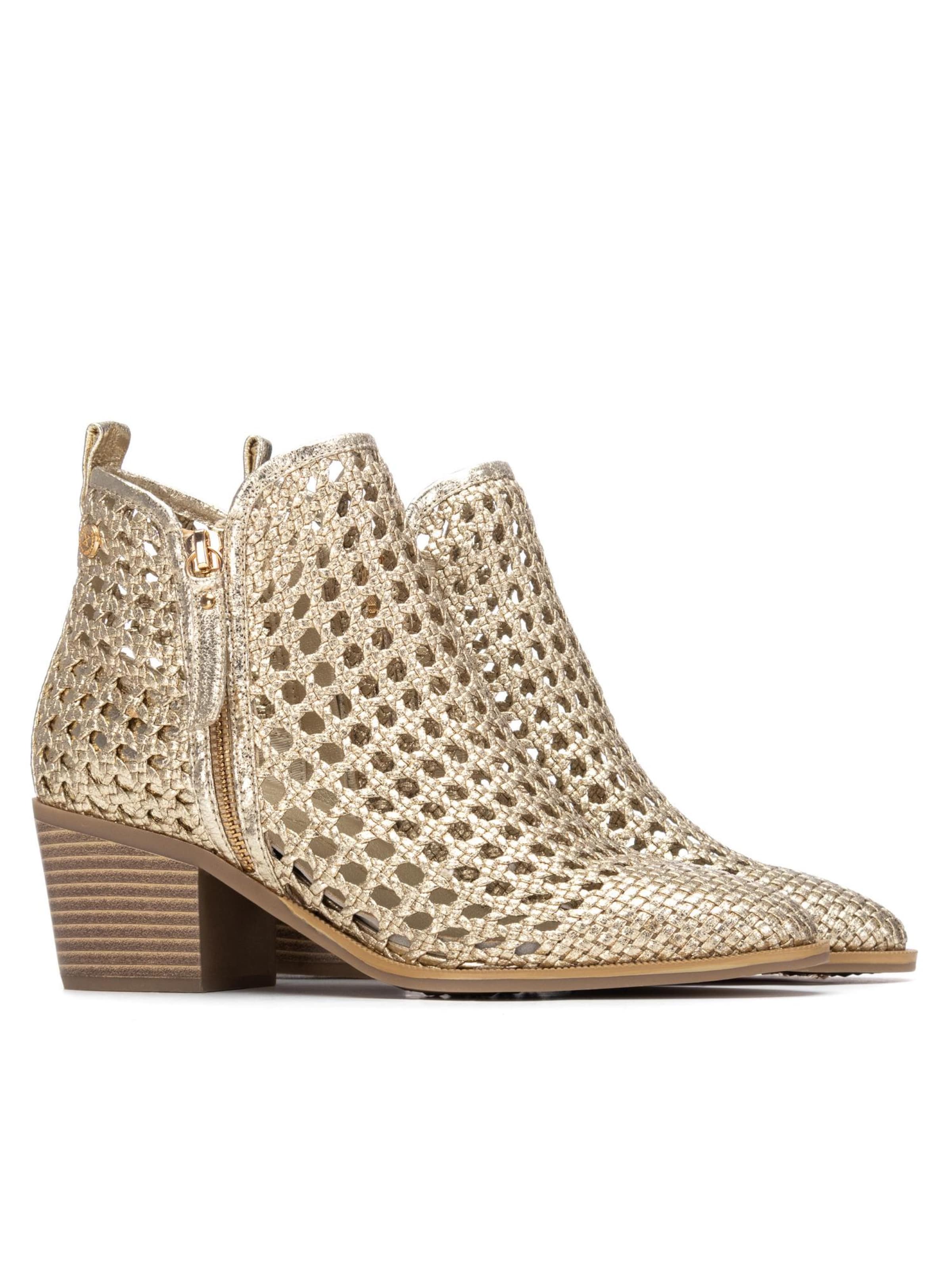 Xti - Botines en oro