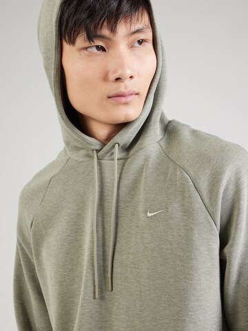 NIKE Спортивный свитшот 'PRIMARY' в Зеленый
