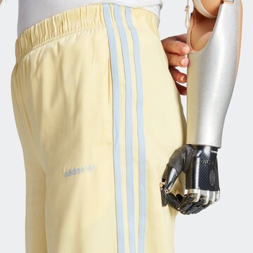 ADIDAS ORIGINALS Wide leg Pants in Yellow