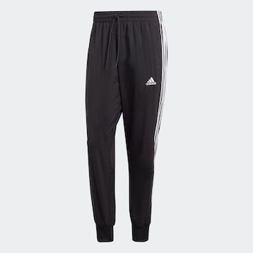 ADIDAS SPORTSWEAR Tapered Sports trousers 'Essentials' in Black: front