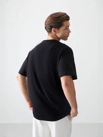 Tommy Life T-Shirts in Schwarz