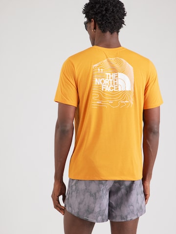 THE NORTH FACE - Camiseta funcional 'BITMAP' en naranja: frente