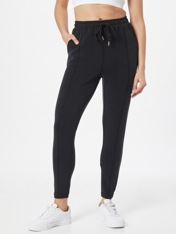 Skinny Pantalon de sport 'Jacey' Athlecia en noir : devant