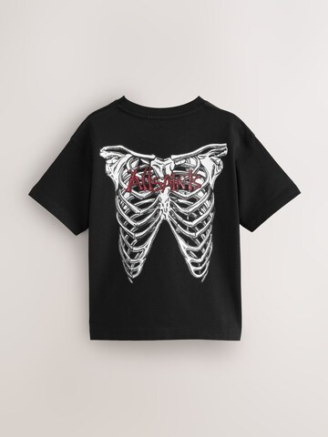 Tricou de la smALLSAINTS pe negru