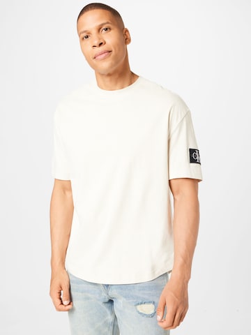 T-Shirt Calvin Klein Jeans en beige : devant