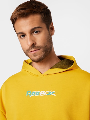Reebok - Sweatshirt de desporto em amarelo
