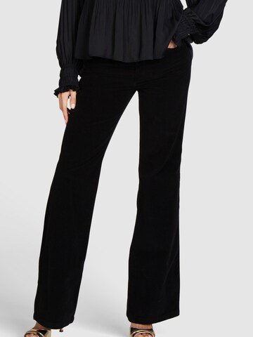 MARC AUREL Flared Pants in Black: front