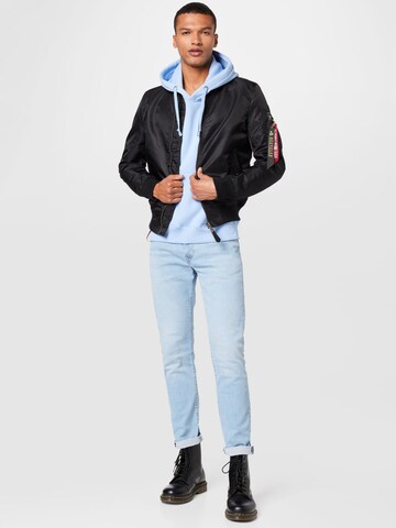 Geacă de primăvară-toamnă de la ALPHA INDUSTRIES pe negru