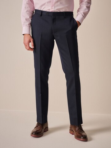 Coupe slim Pantalon à plis Next en bleu