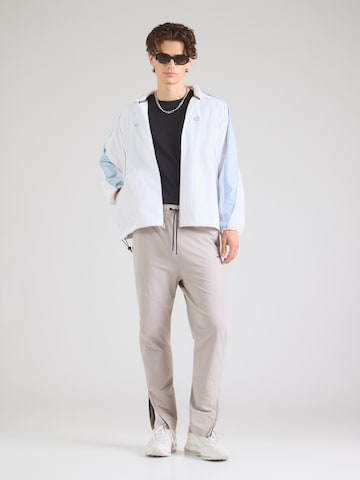 Nike Sportswear Tapered Hose in Grau