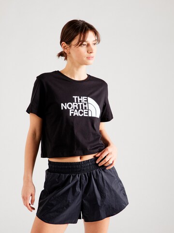 THE NORTH FACE T-shirt i svart: framsida