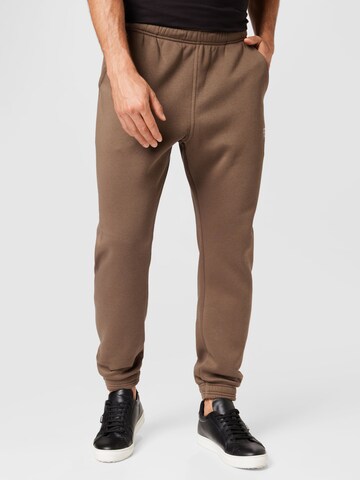 G-Star RAW Tapered Pants in Brown: front