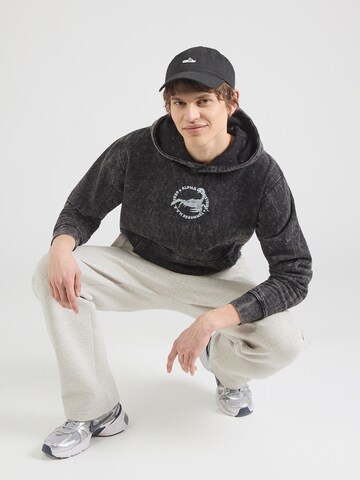 ALPHA INDUSTRIES Bluzka sportowa 'Scorpion' w kolorze czarny