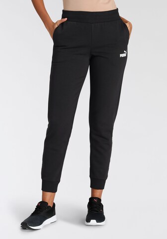 PUMA - Tapered Pantalón deportivo en negro: frente