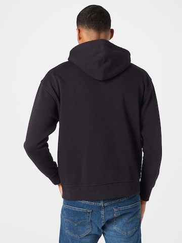 LEVI'S ® - Regular Fit Sweatshirt 'T3 Relaxd Graphic Hoodie' em preto