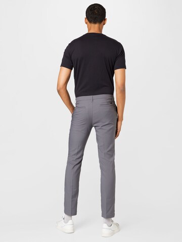 Slimfit Pantaloni sportivi di ADIDAS GOLF in grigio