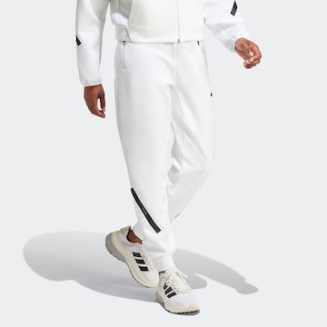ADIDAS SPORTSWEAR Конический (Tapered) Спортивные штаны 'W Z.N.E. PT' в Белый