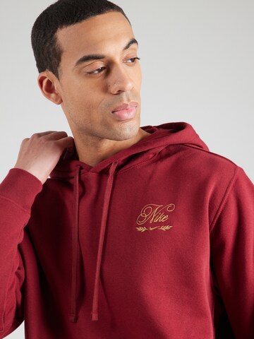 Sweat-shirt 'CLUB' Nike Sportswear en rouge