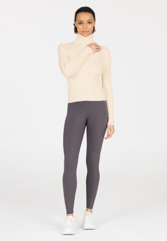 Athlecia Trui in Beige