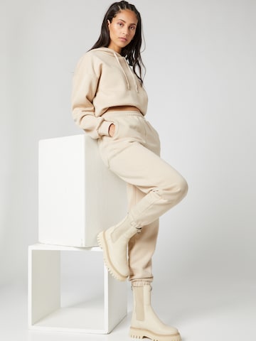 regular Pantaloni 'Kitty' di Hoermanseder x About You in beige