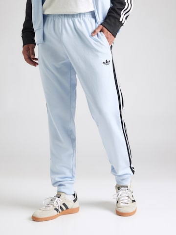 ADIDAS ORIGINALSTapered Hlače 'SST' - plava boja: prednji dio