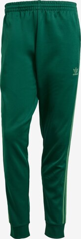 ADIDAS ORIGINALS Tapered Pants 'Adicolor Classics SST' in Green: front