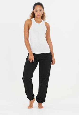 Athlecia Tapered Sports trousers 'Giannis' in Black