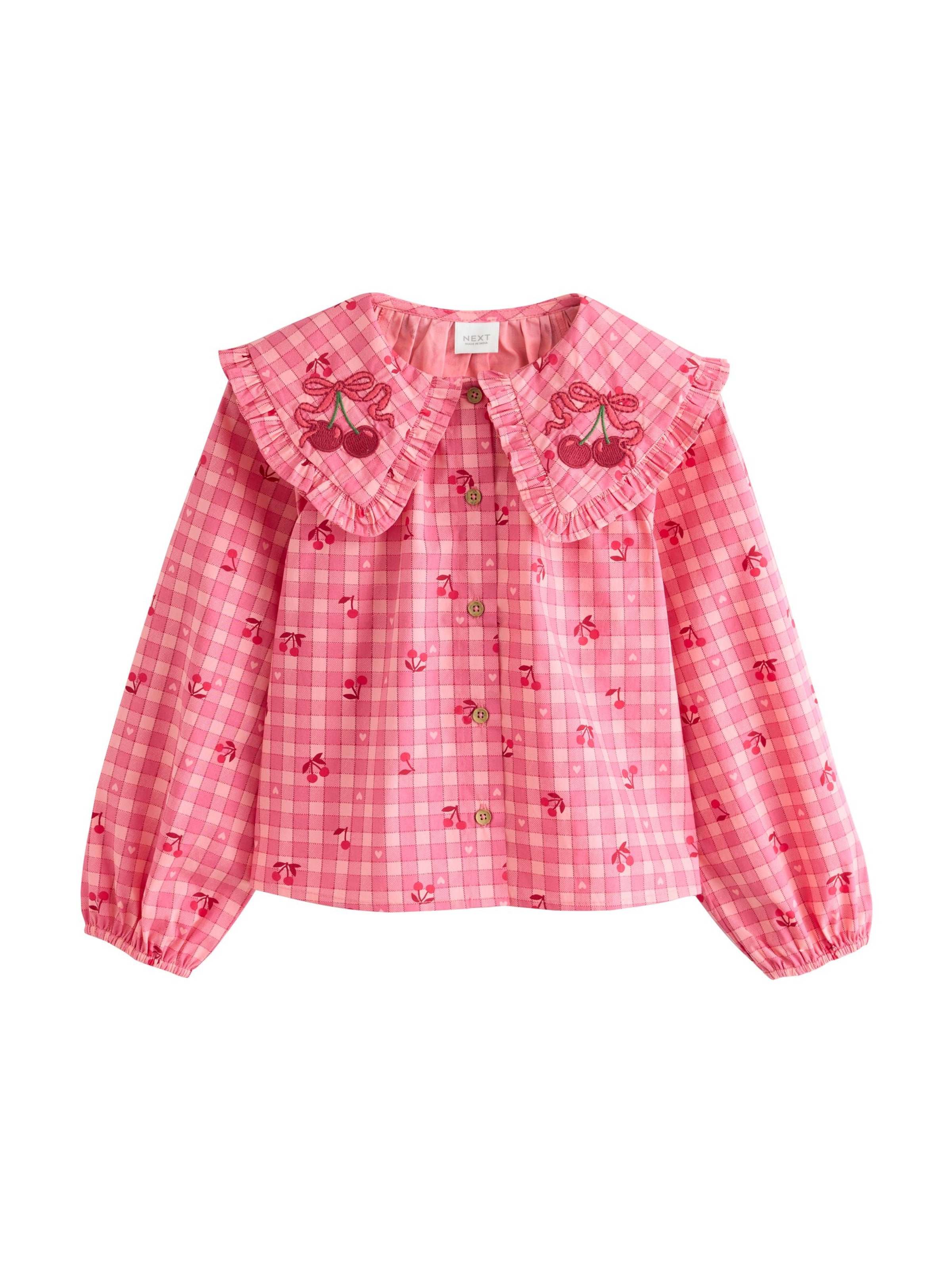 Next Blus i rosa: framsida