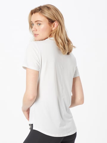 T-shirt fonctionnel 'One' NIKE en blanc