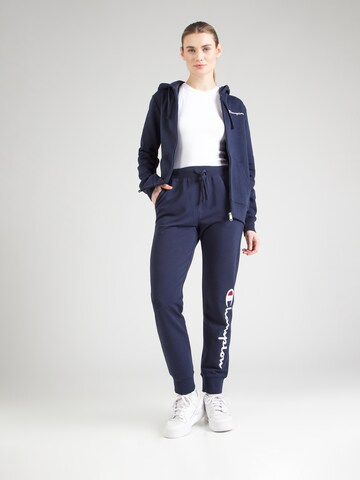 Tapered Pantaloni di Champion Authentic Athletic Apparel in blu