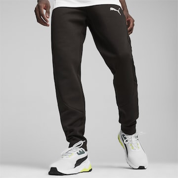 PUMA Slim fit Workout Pants 'Evostripe' in Black: front