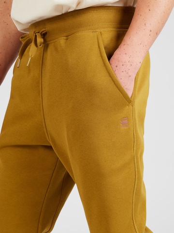 G-Star RAW Дънки Tapered Leg Панталон 'Premium core' в кафяво