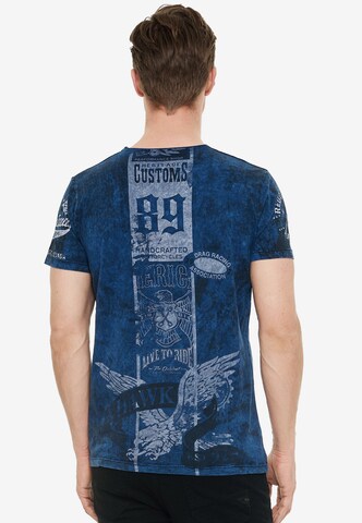 Rusty Neal T-Shirt mit modernem Front & Back Print in Blau